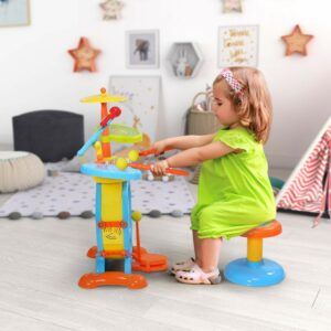 Benefits of musical instruments for toddlers-girl playing Drum Set