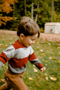 Photo Of Toddler Running On Grass