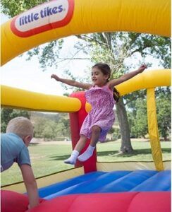 kids play in the inflatable bounce house