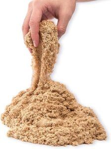 hand with kinetic sand