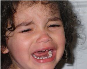 a toddler girl cry