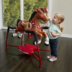 A girl play with Interactive Riding Horse